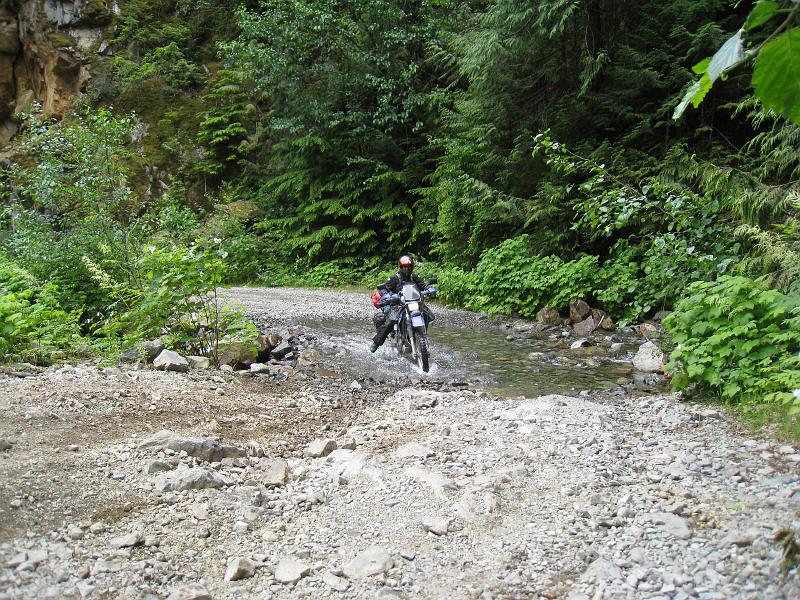 IMG_0517.jpg - BC2AK trip; AG on second water crossing;  Roads? who needs roads!