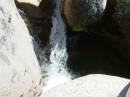 Sierra Swimming hole trip 20040730; Beasore loop (50 miles of central high Sierras above [East] of Bass lake); Second swiming hole area; Water fall hole.  Care to take a cold shower?x