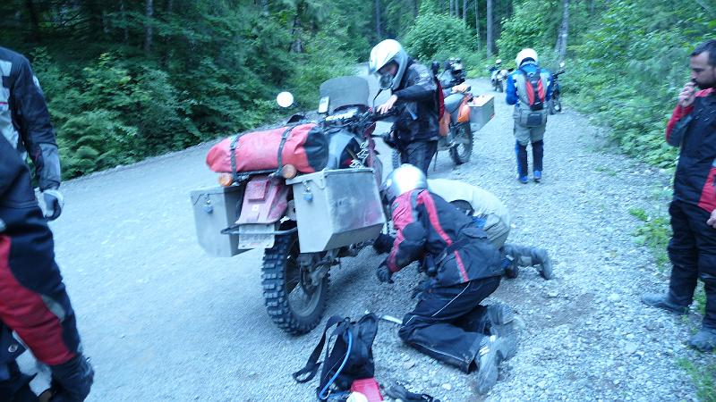 bc2ak-P0025.JPG - Alaska trip 08; bc2ak;Harrison Lake West;Vexorg takes the first low side, bends frame but limps to camp; Front brake failure comming into corner at speed; Failure mode: air bubble gets into brake line.